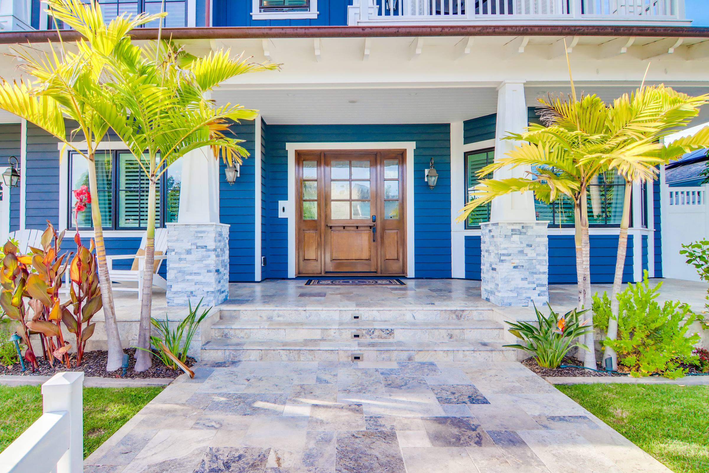 Front entry of a custom coastal home built by Laurcon Development in Coronado, California