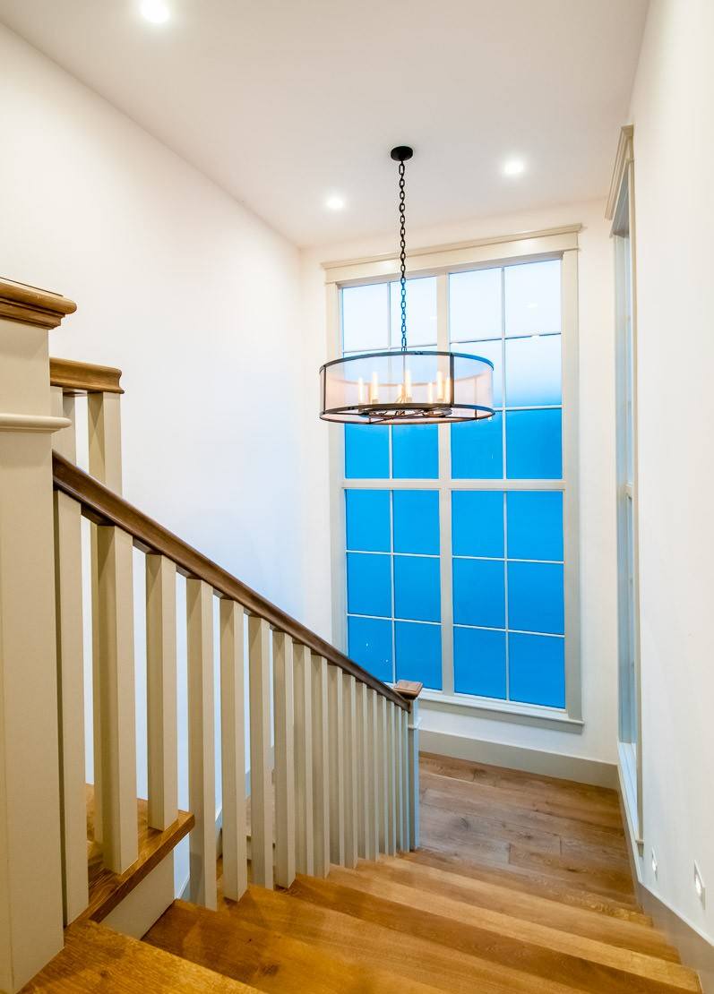 Interior stair detail in a custom home built by Laurcon Development