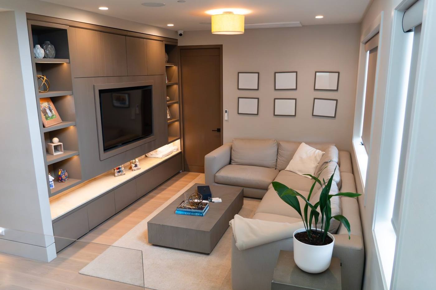 Media room with built in cabinetry