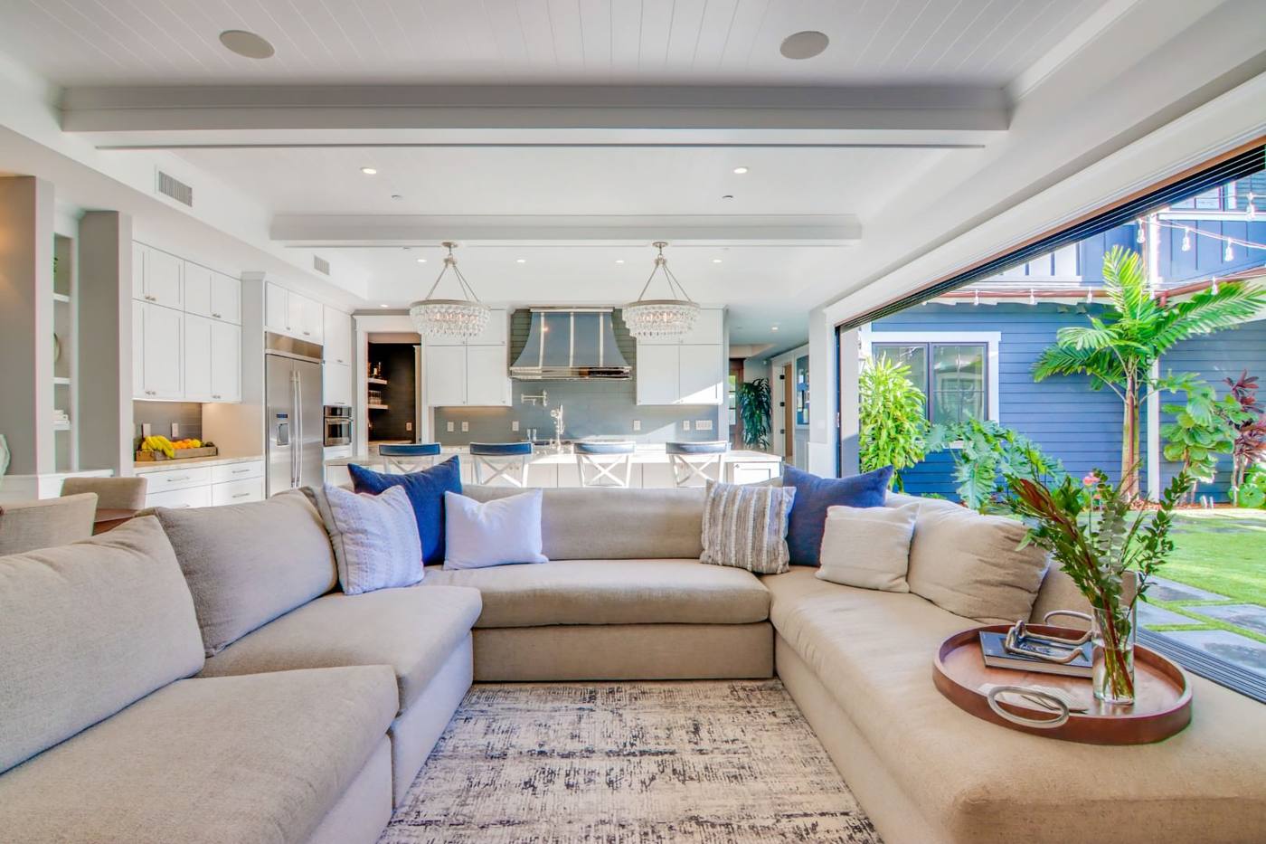 Great room with oversized sliding doors open to the yard