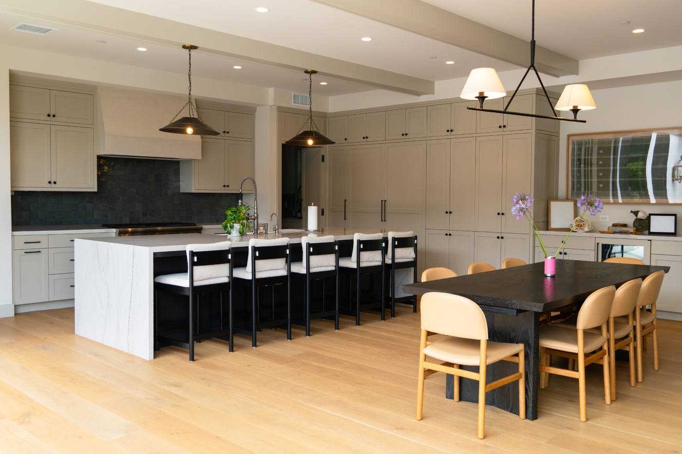 Kitchen with island seating open to the dining table