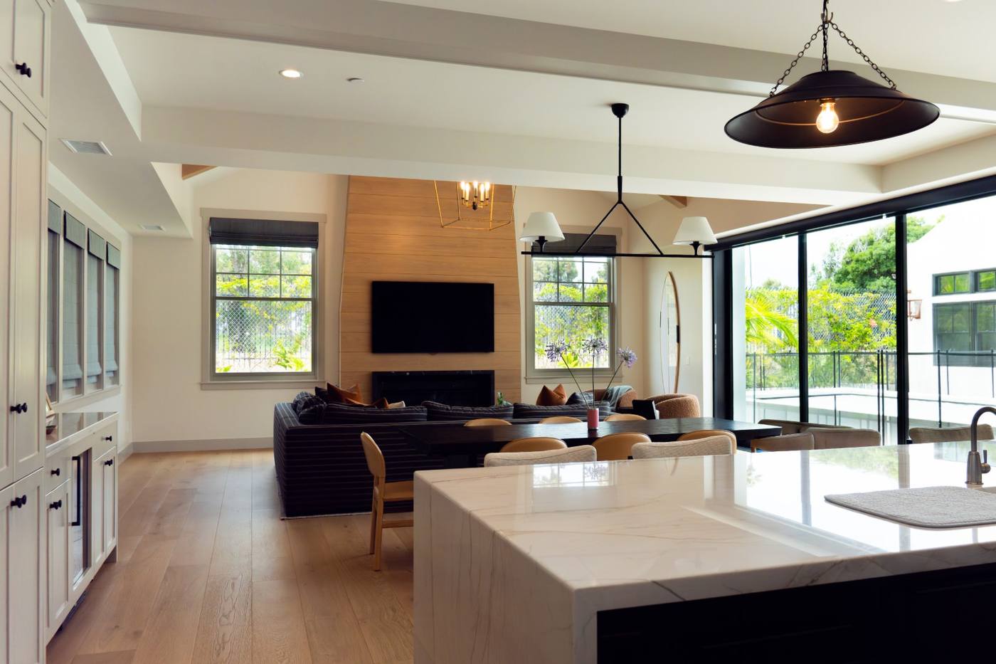 Kitchen island with sliding doors open to the yard