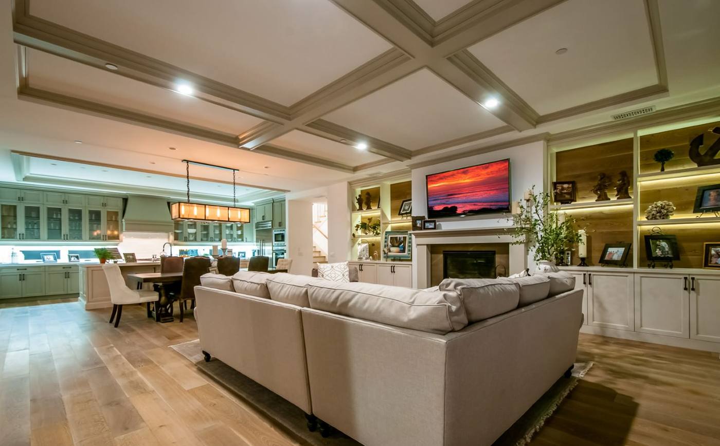 Great room with coffered ceiling and fireplace