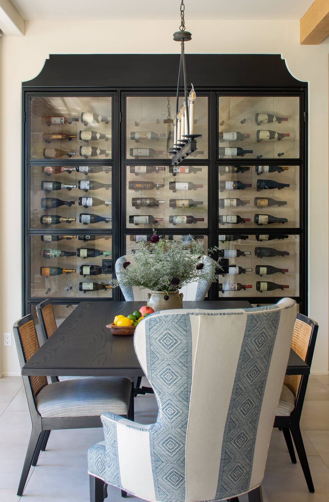Breakfast room with a glazed wine wall