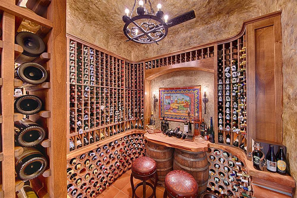 Wine room with custom racking and vaulted ceiling